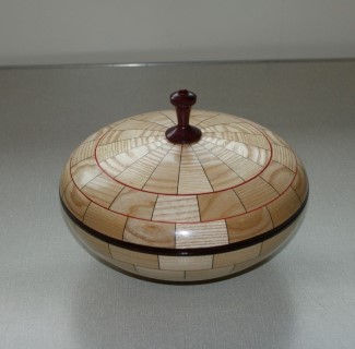 Segmented lidded bowl won turning of the month certificate for Chris Withall